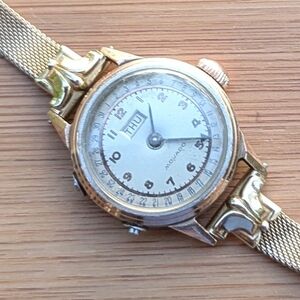 Movado Gold Watch